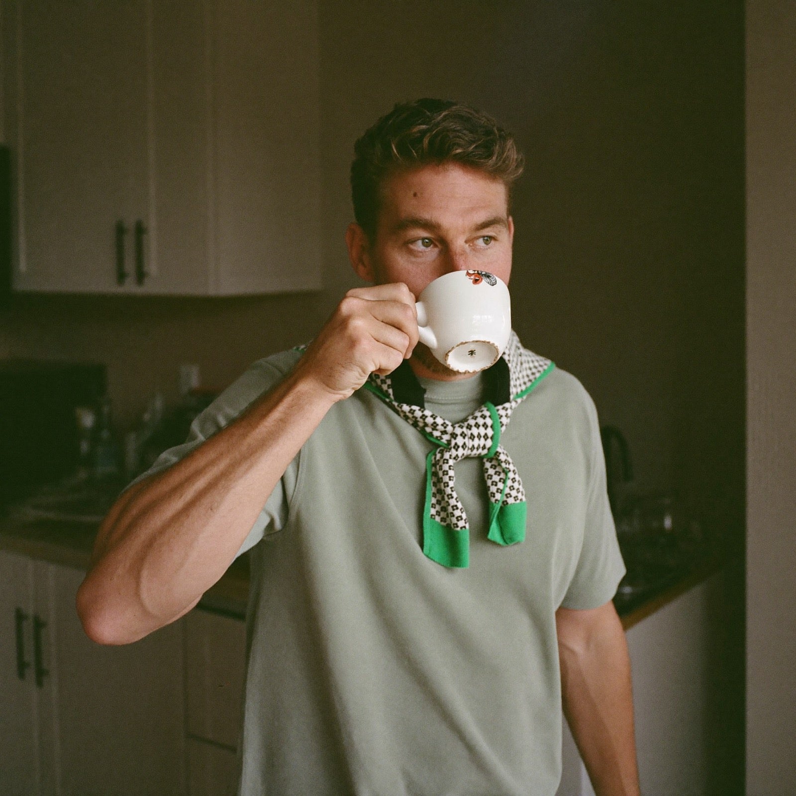 A man with a calm, clear-headed morning coffee